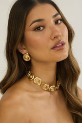 Noxelle Spiral Shell Earrings Gold